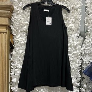 New black size xs top with pockets by Mtn mamas